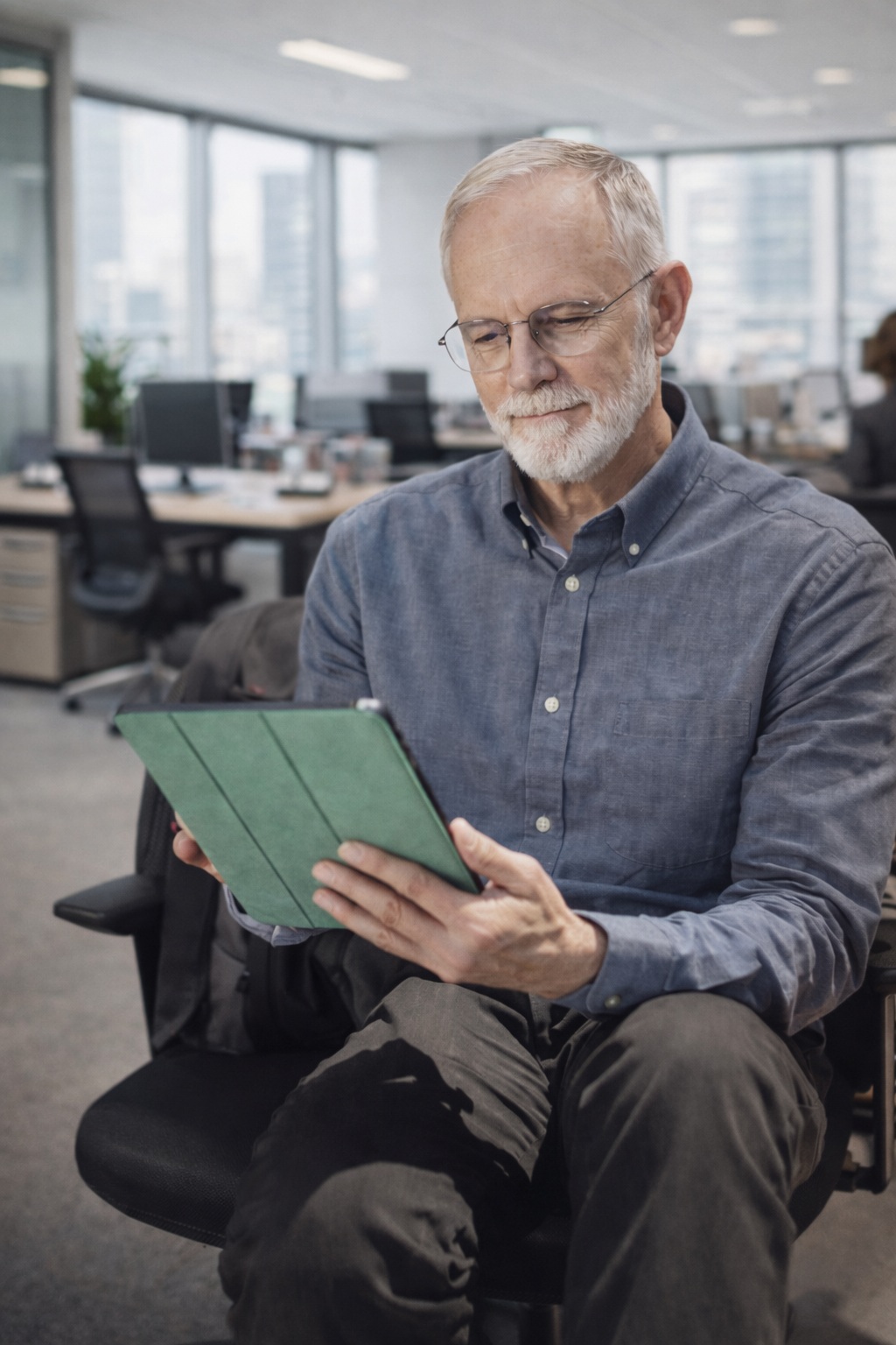 Business man reviewing submitted files in mobile app